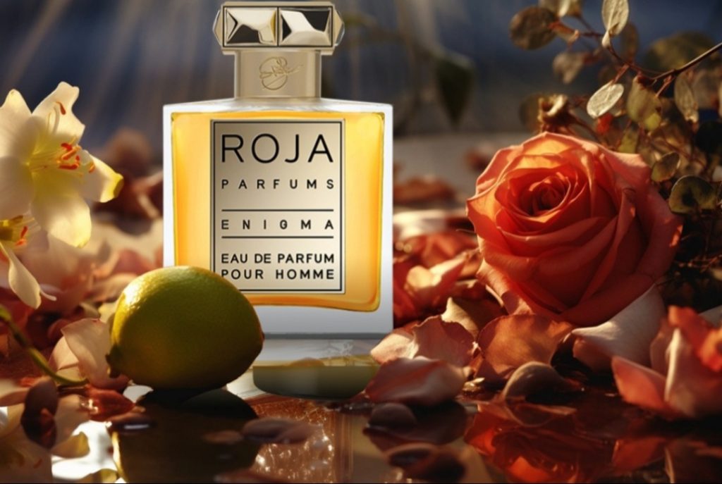 عطر مردانه برند روژا انیگما با بطری به رنگهای سفید و زرد